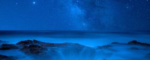 Preview wallpaper sea, coast, starry sky, night