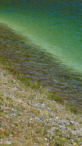 Preview wallpaper sea, coast, stones, grass, pebbles