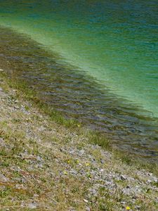 Preview wallpaper sea, coast, stones, grass, pebbles