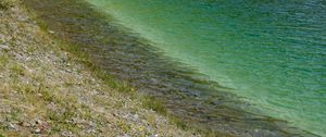 Preview wallpaper sea, coast, stones, grass, pebbles