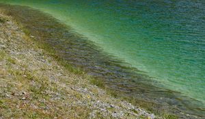 Preview wallpaper sea, coast, stones, grass, pebbles