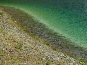 Preview wallpaper sea, coast, stones, grass, pebbles