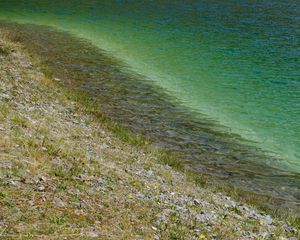 Preview wallpaper sea, coast, stones, grass, pebbles