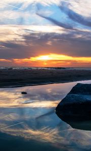 Preview wallpaper sea, coast, stones, sunset, dusk, landscape