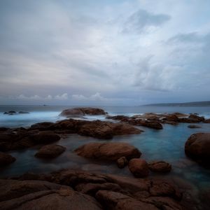 Preview wallpaper sea, coast, stones, water, horizon, nature