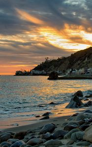 Preview wallpaper sea, coast, stones, buildings, bay