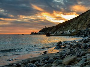 Preview wallpaper sea, coast, stones, buildings, bay