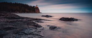 Preview wallpaper sea, coast, sunset, stones, water, fog