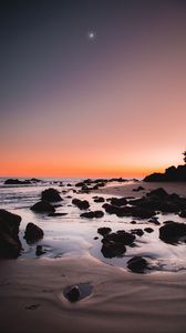 Preview wallpaper sea, coast, sunset, stones, sand, horizon