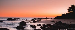 Preview wallpaper sea, coast, sunset, stones, sand, horizon