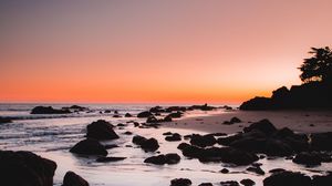 Preview wallpaper sea, coast, sunset, stones, sand, horizon