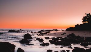 Preview wallpaper sea, coast, sunset, stones, sand, horizon