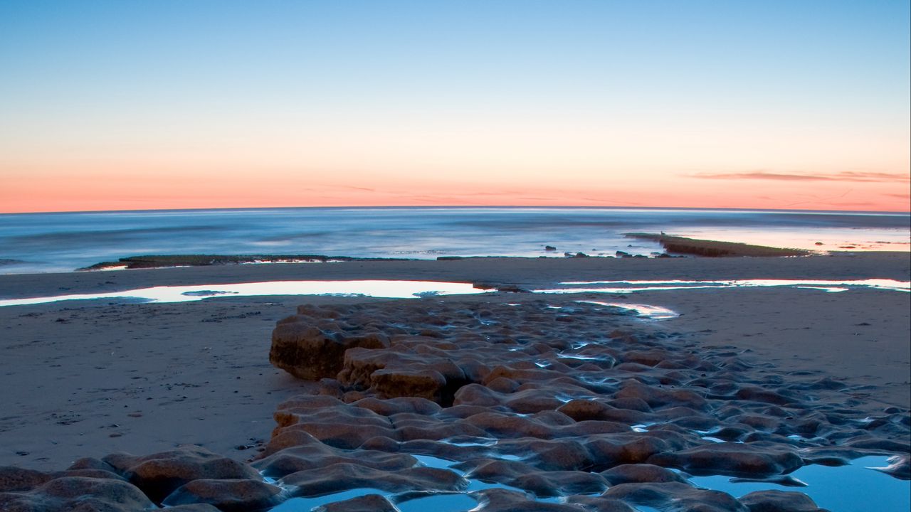 Wallpaper sea, coast, sunset, sand, stones, horizon