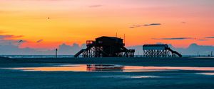 Preview wallpaper sea, coast, sunset, water, sky, puddle