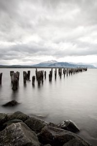 Preview wallpaper sea, distance, mountains, pillars