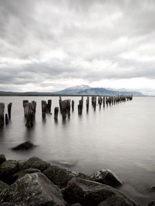 Preview wallpaper sea, distance, mountains, pillars