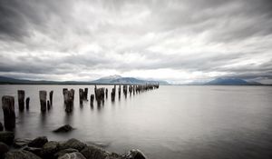 Preview wallpaper sea, distance, mountains, pillars