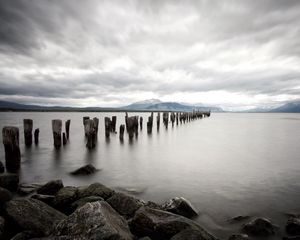 Preview wallpaper sea, distance, mountains, pillars