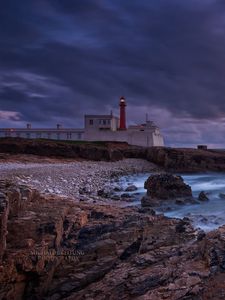 Preview wallpaper sea, evening, lighthouse, portugal, coast