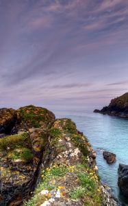 Preview wallpaper sea, evening, stones, rocks, grass