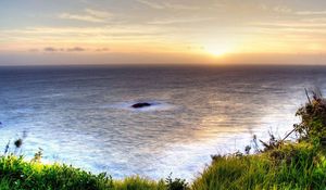 Preview wallpaper sea, height, coast, greens, vegetation, evening, decline, horizon, landscape