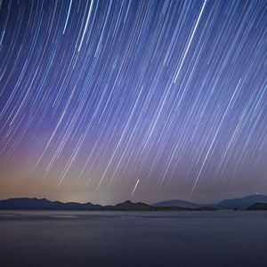 Preview wallpaper sea, hills, starry sky, freezelight, night