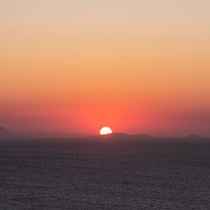 Preview wallpaper sea, hills, sunset, nature