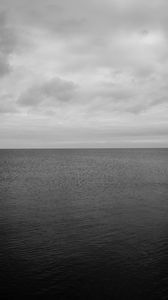 Preview wallpaper sea, horizon, bw, sky, clouds