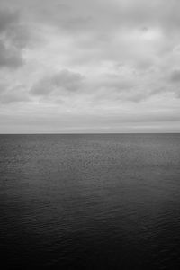 Preview wallpaper sea, horizon, bw, sky, clouds