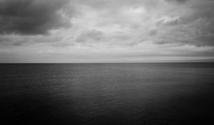 Preview wallpaper sea, horizon, bw, sky, clouds