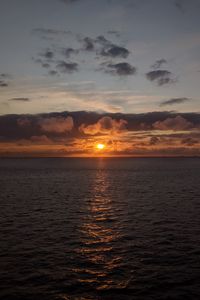 Preview wallpaper sea, horizon, clouds, sun, sunset, dark