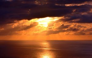 Preview wallpaper sea, horizon, clouds, sunset, dark