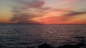 Preview wallpaper sea, horizon, evening, stones, dark, nature