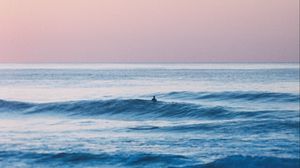 Preview wallpaper sea, horizon, man, waves, sky