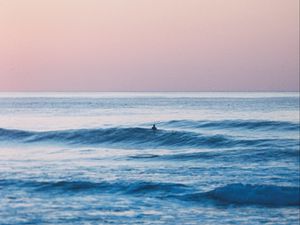 Preview wallpaper sea, horizon, man, waves, sky