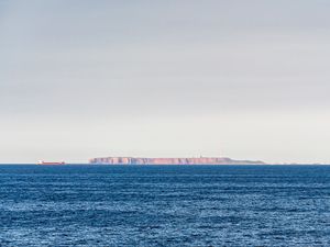 Preview wallpaper sea, horizon, rocks, ship