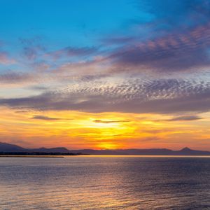 Preview wallpaper sea, horizon, sky, clouds, sunrise