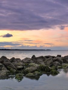 Preview wallpaper sea, horizon, stones, landscape, twilight