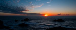 Preview wallpaper sea, horizon, sun, sunset, clouds, landscape, dark