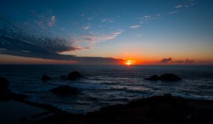 Preview wallpaper sea, horizon, sun, sunset, clouds, landscape, dark