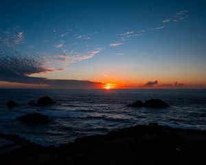 Preview wallpaper sea, horizon, sun, sunset, clouds, landscape, dark