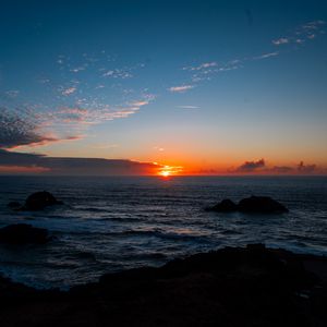 Preview wallpaper sea, horizon, sun, sunset, clouds, landscape, dark