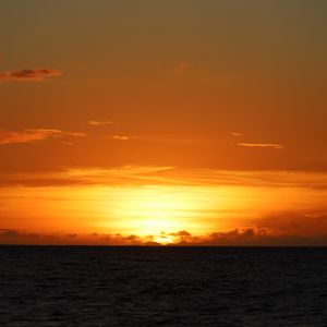 Preview wallpaper sea, horizon, sun, sunset, dark
