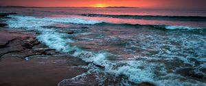 Preview wallpaper sea, horizon, sunset, waves, foam, surf, beach