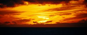 Preview wallpaper sea, horizon, sunset, clouds, fiery, sky