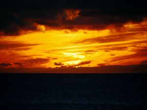 Preview wallpaper sea, horizon, sunset, clouds, fiery, sky