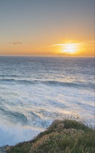 Preview wallpaper sea, horizon, waves, sunset, shore, grass
