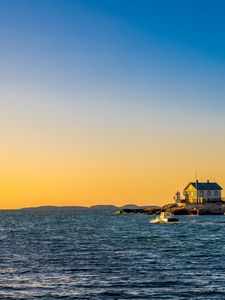 Preview wallpaper sea, houses, sky, sunset