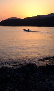 Preview wallpaper sea, island, bay, boat, twilight, silhouettes