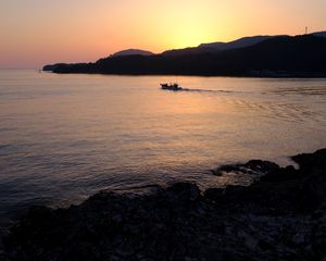 Preview wallpaper sea, island, bay, boat, twilight, silhouettes